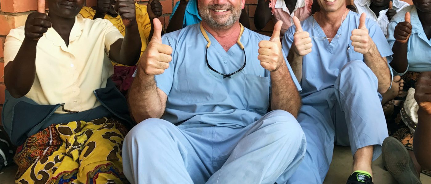 Kenneth Peters, M.D. (center) has been leading a mission to Africa for 13 years, with the last 10 going to Zambia.
