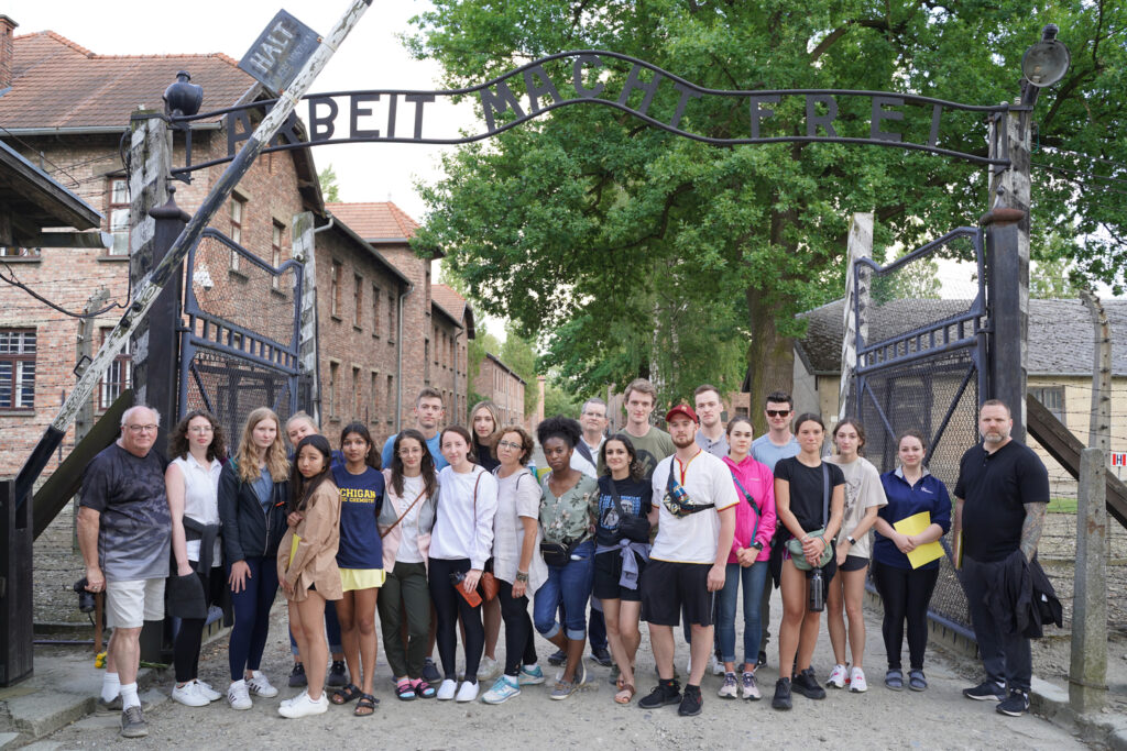 Students at the gate of Auschwitz 1